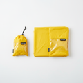 Rainproof stadium poncho set of 2 in yellow, folded into compact pouches
